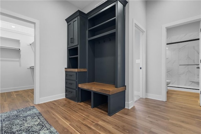 17186 S Heatherwood St, Olathe, KS 66062 - mudroom featuring wood finished floors and baseboards