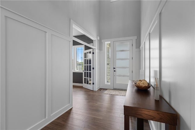 17186 S Heatherwood St, Olathe, KS 66062 - foyer entrance with dark wood finished floors and baseboards
