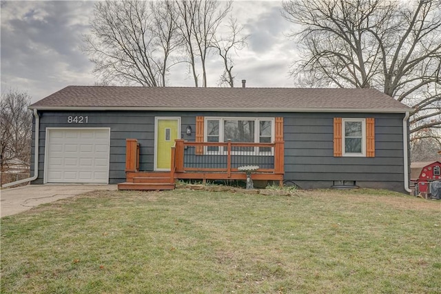 single story home with a garage and a front yard