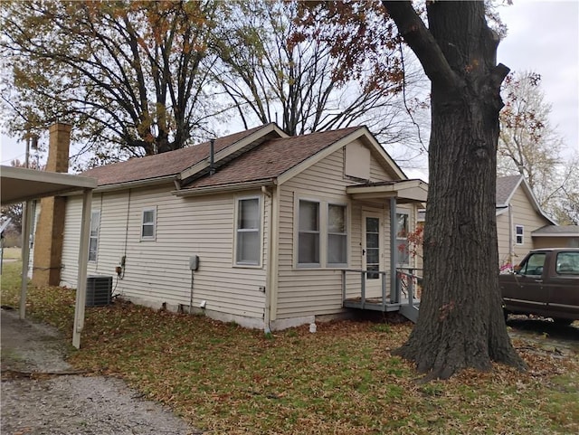 view of property exterior featuring central AC