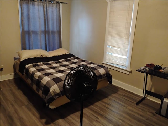 bedroom featuring dark hardwood / wood-style floors