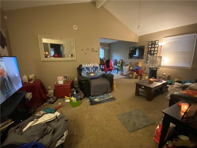 living area featuring beam ceiling, high vaulted ceiling, and carpet