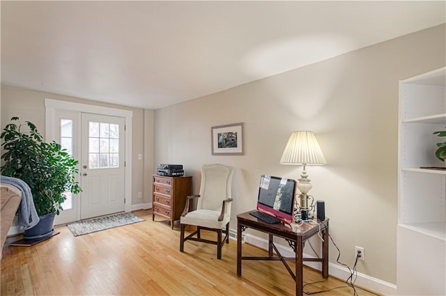 foyer entrance featuring hardwood / wood-style flooring