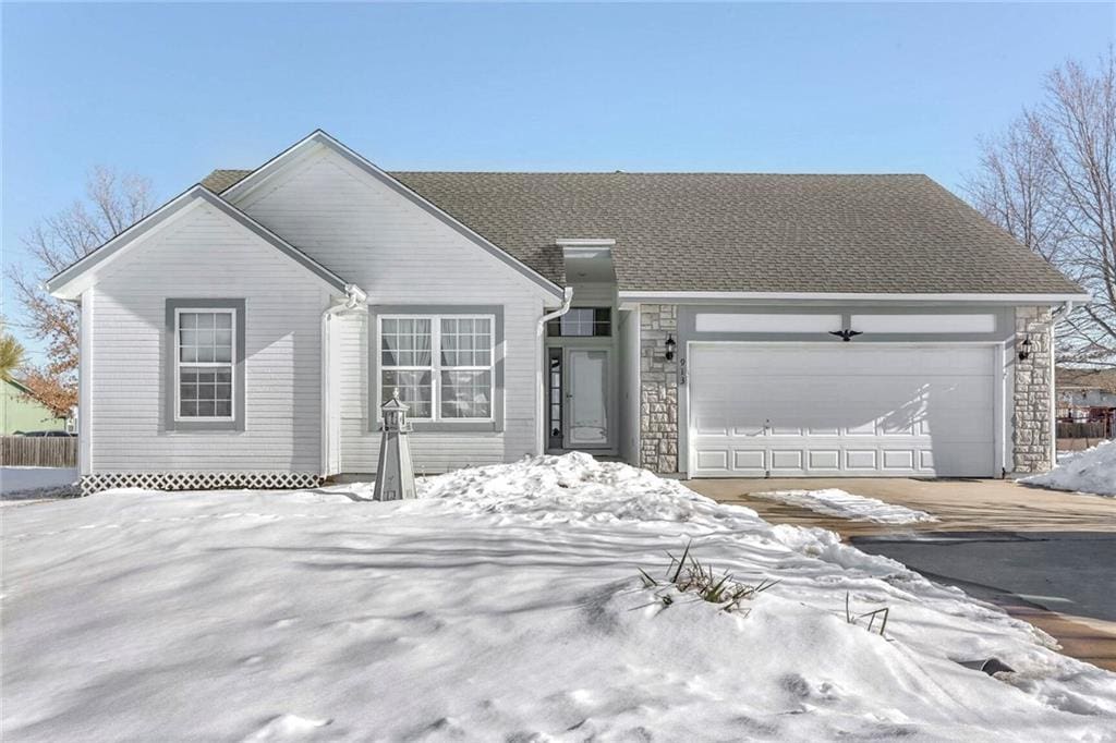 ranch-style home with a garage