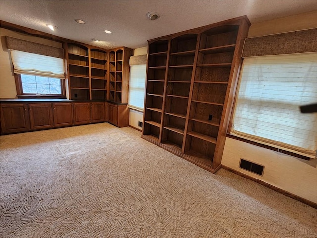 interior space with a textured ceiling