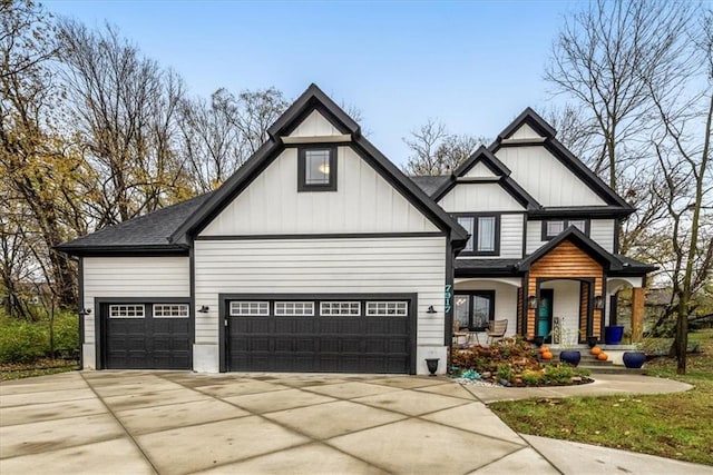 view of front of home with a garage and a porch