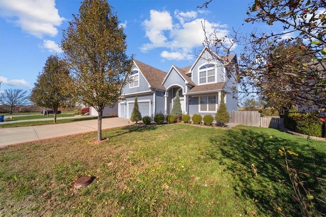 view of front facade featuring a front lawn and a garage