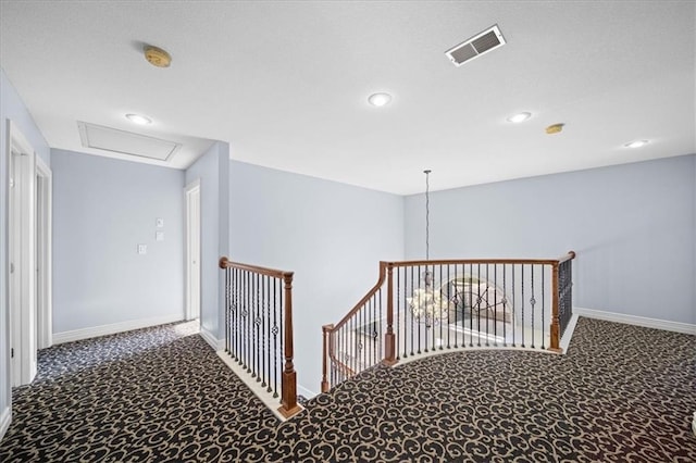 hallway featuring carpet floors