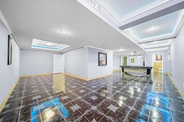 interior space with pool table, ornamental molding, and a textured ceiling