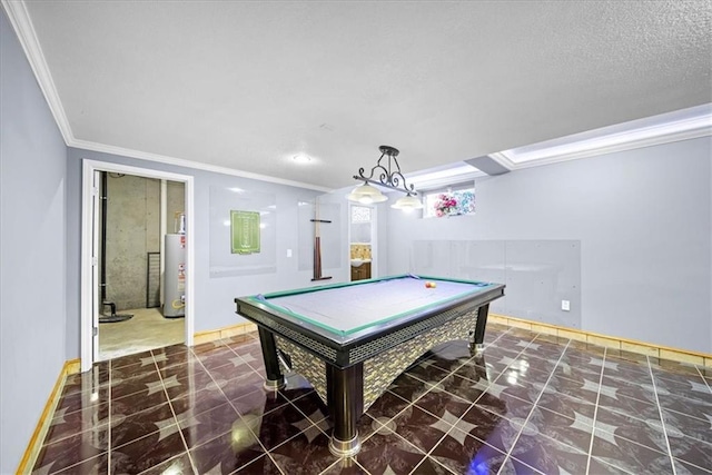 game room with pool table, crown molding, and water heater