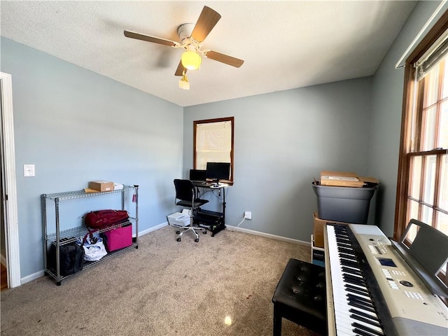 carpeted office with ceiling fan