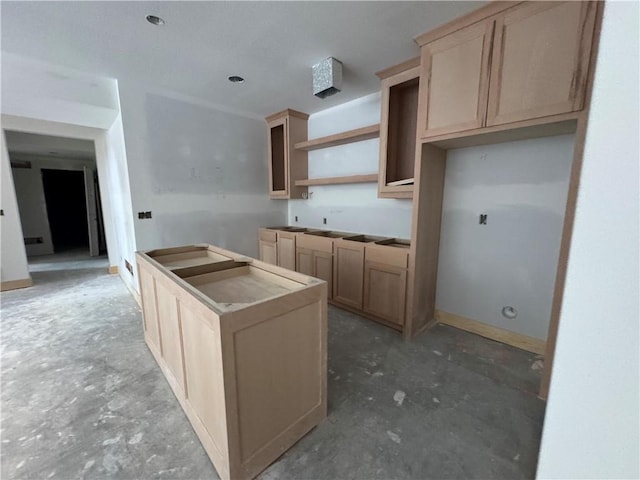 kitchen with light brown cabinetry