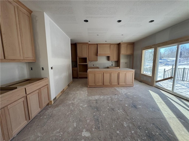 kitchen with light brown cabinetry