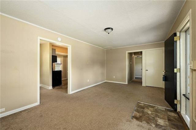 unfurnished bedroom with dark colored carpet