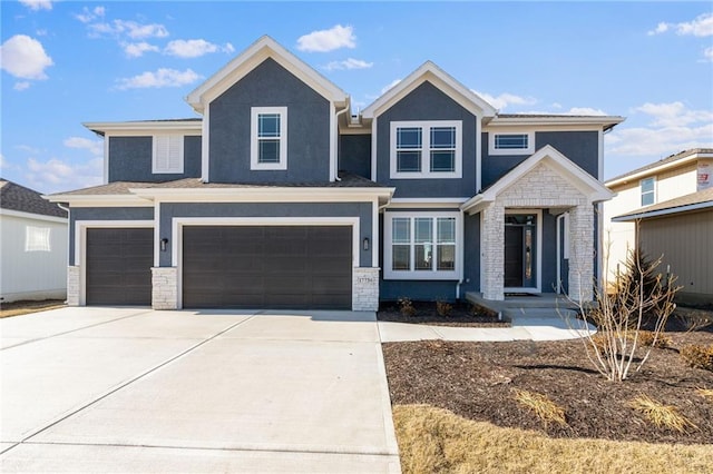 craftsman house with driveway, stone siding, an attached garage, and stucco siding