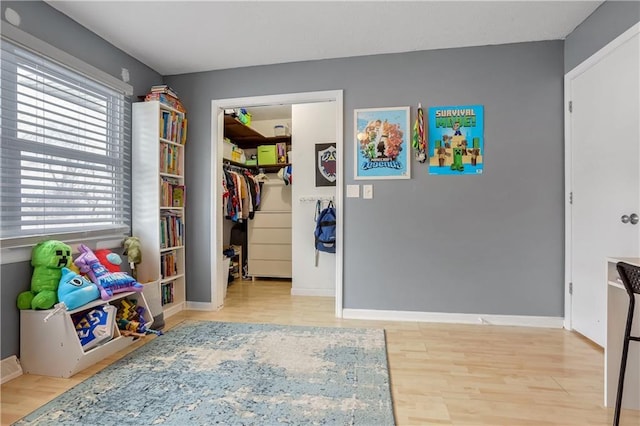 game room featuring light hardwood / wood-style floors