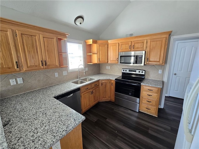 kitchen featuring visible vents, open shelves, dark wood-style flooring, a sink, and appliances with stainless steel finishes