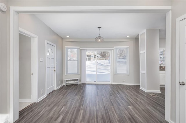 interior space with dark hardwood / wood-style floors and sink