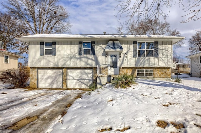 raised ranch featuring a garage