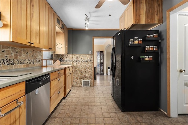 kitchen with ceiling fan, dishwasher, black fridge, sink, and track lighting