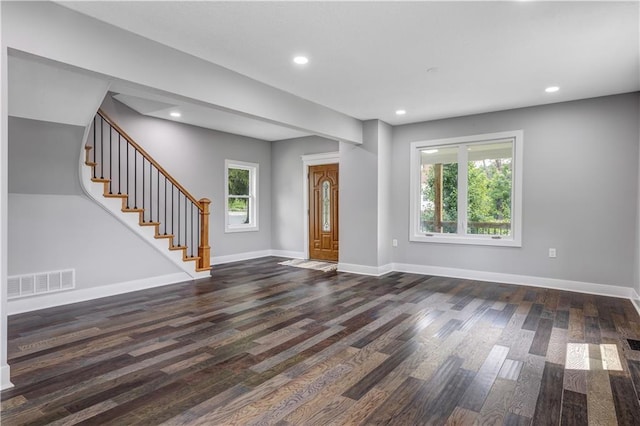 entrance foyer with dark wood-type flooring