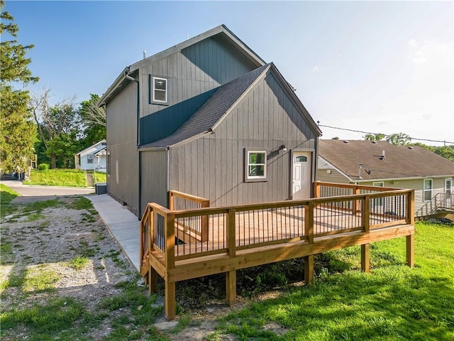 rear view of house with a deck