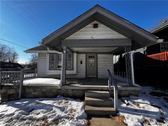 bungalow featuring covered porch