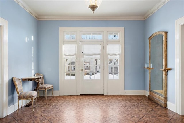 doorway to outside featuring parquet flooring, french doors, and crown molding