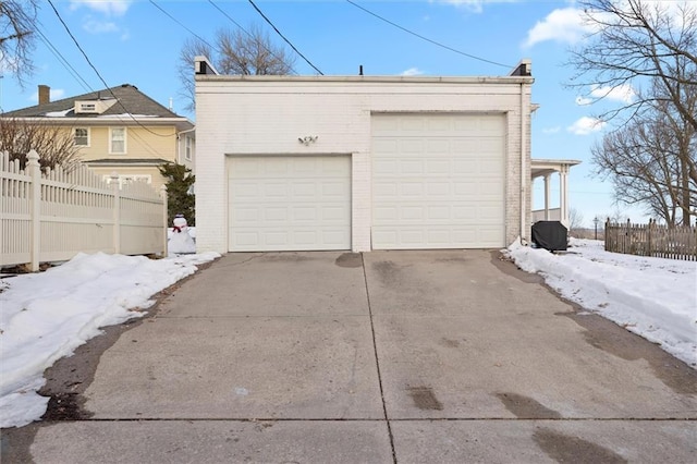 view of snow covered garage