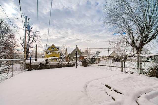 view of yard covered in snow