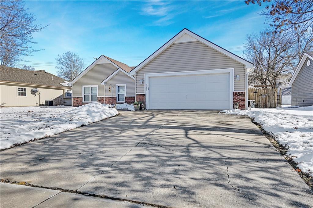 single story home with central air condition unit