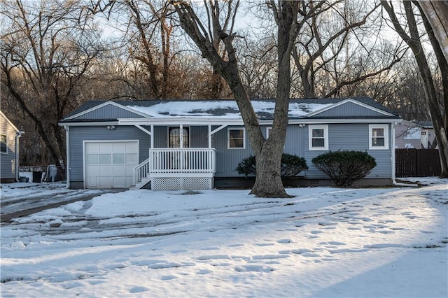 ranch-style home with a garage