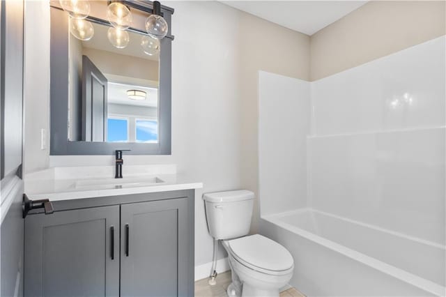 full bath featuring baseboards, shower / bathing tub combination, vanity, and toilet