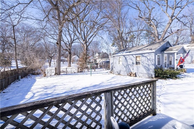 view of yard covered in snow