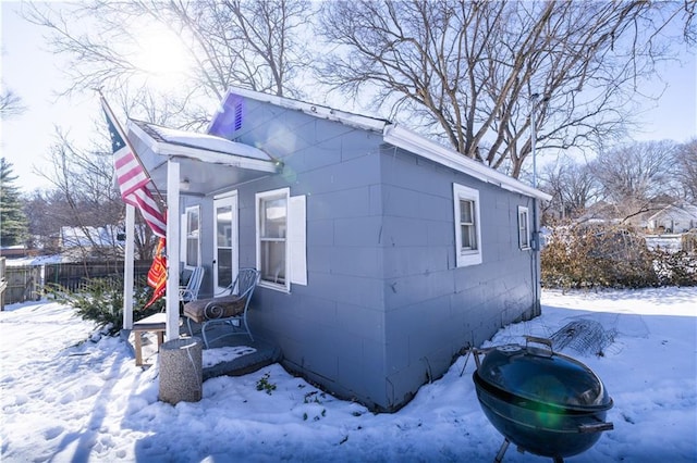 view of snow covered property