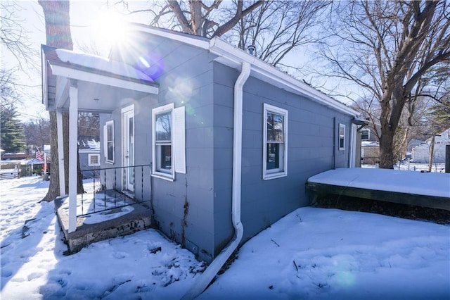 view of snow covered property