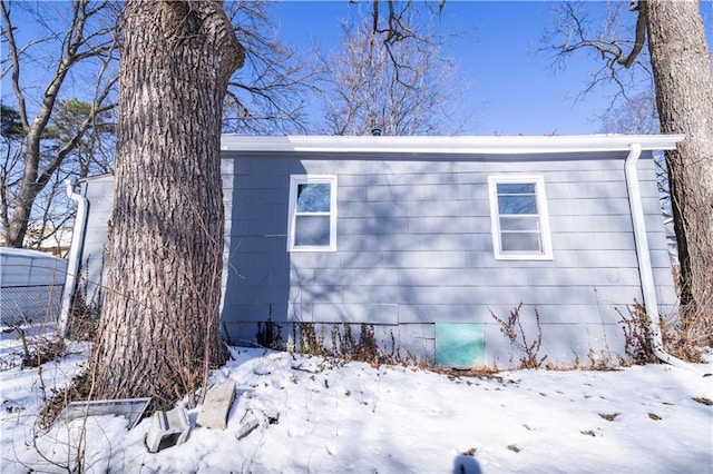 view of snow covered property