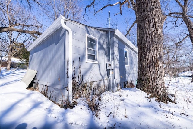 view of snow covered property