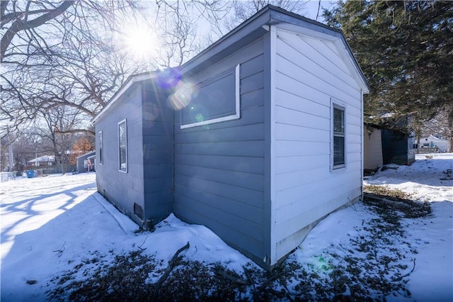 view of snow covered property