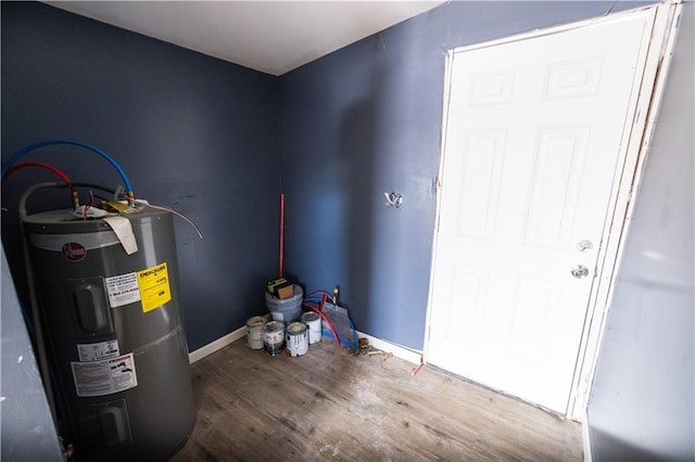 utility room with electric water heater