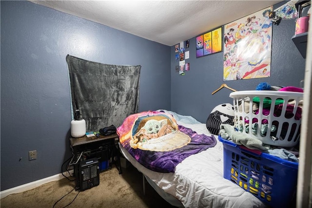bedroom featuring carpet floors, a textured ceiling, baseboards, and a textured wall