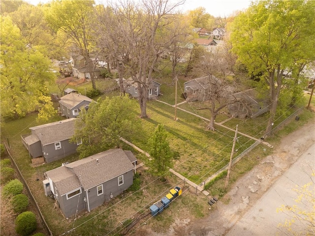 birds eye view of property with a residential view