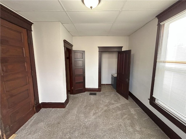 unfurnished bedroom with light carpet