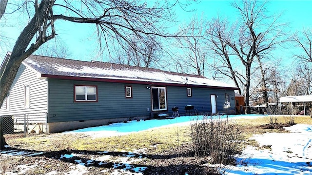 view of snow covered property