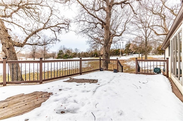 view of snow covered deck