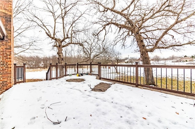 view of yard covered in snow