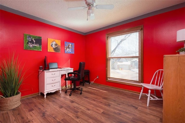 office area with ceiling fan, dark hardwood / wood-style flooring, and a textured ceiling