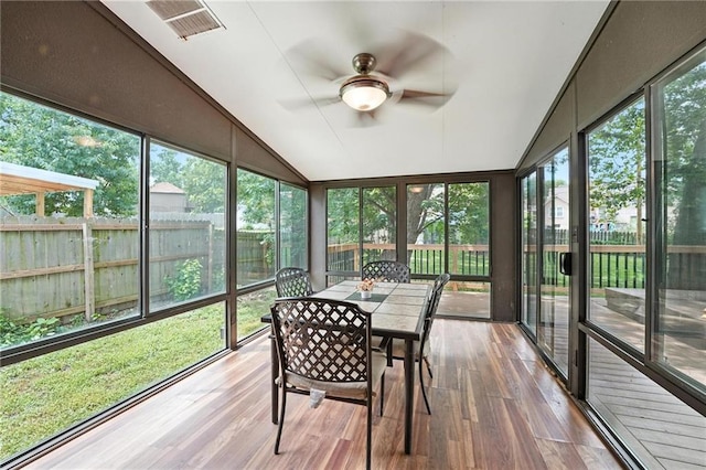 4722 Switzer Rd, Shawnee, KS 66203 - sunroom with a ceiling fan, lofted ceiling, outdoor dining space, and plenty of natural light