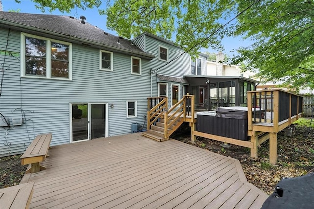 4722 Switzer Rd, Shawnee, KS 66203 - wooden deck with a sunroom and a hot tub