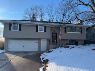 bi-level home featuring a garage